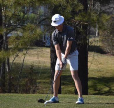 Senior Kory Hummer prepares to swing at the ball. 