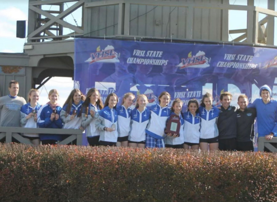 The Cross Country team celebrating their State Championship win on Nov. 13 at Great Meadow Park.