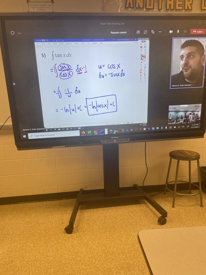 Kareem+Texler+teaches+from+home+while+using+one+of+the+new+Promethean+boards.+