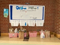 SCA collected donations for the Christmas Mother in the Commons hallway.
