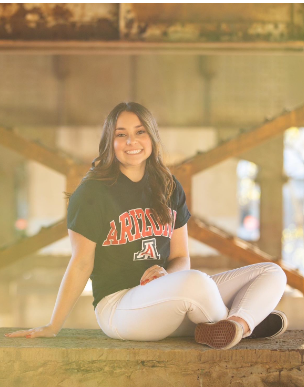 Senior Abigail Moes poses in her University of Arizona t-shirt, just one of the schools on her application short list.