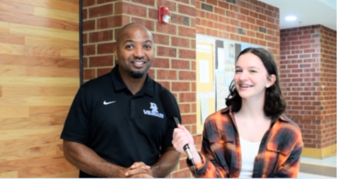 Junior Caroline Grzesiek interviews Associate Principal Marcellus Bland.