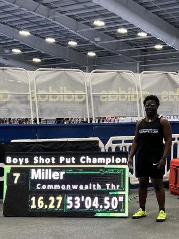 Miller poses beside his statistics at the Adidas Track Nationals in Virginia Beach.