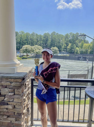 Jocelynn Ginsberg receives a trophy after the L6 tournament in Raleigh North Carolina.

