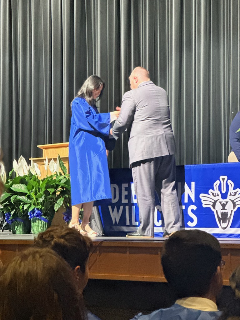 Senior Nina Kang receives an award.