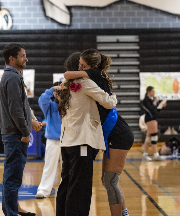 Senior Elise Wisor at her volleyball senior night.