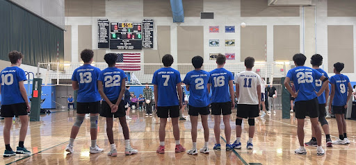 The boys' JV Volleyball team lines up during the semi-finals against Patrick Henry in the Hanover Tournament. 