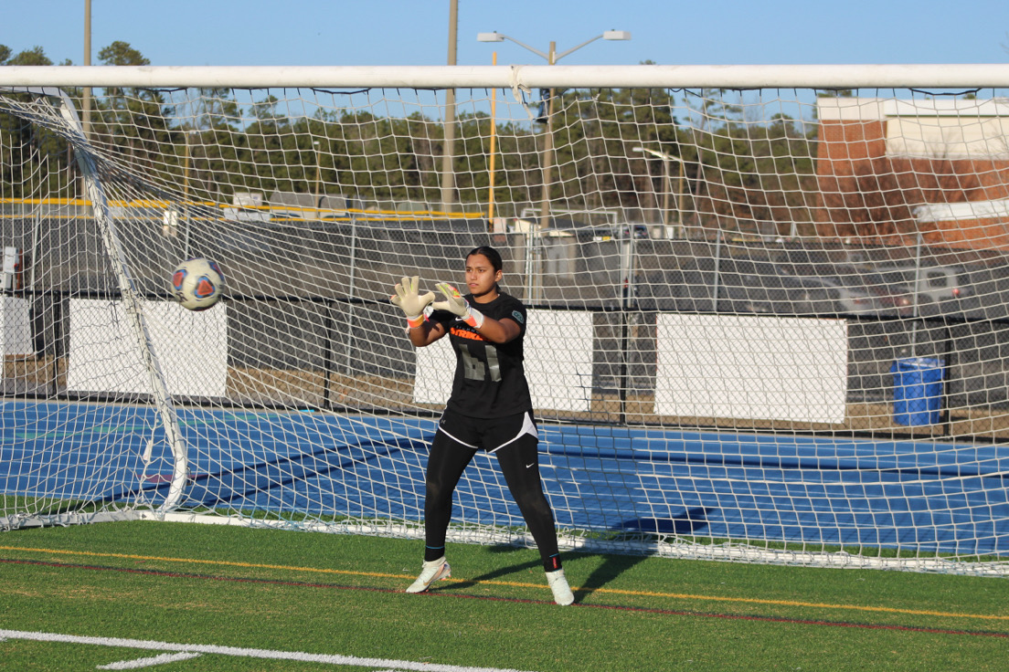 Dutta catches and defends the soccer balls coming her way during girl's soccer tryouts.
