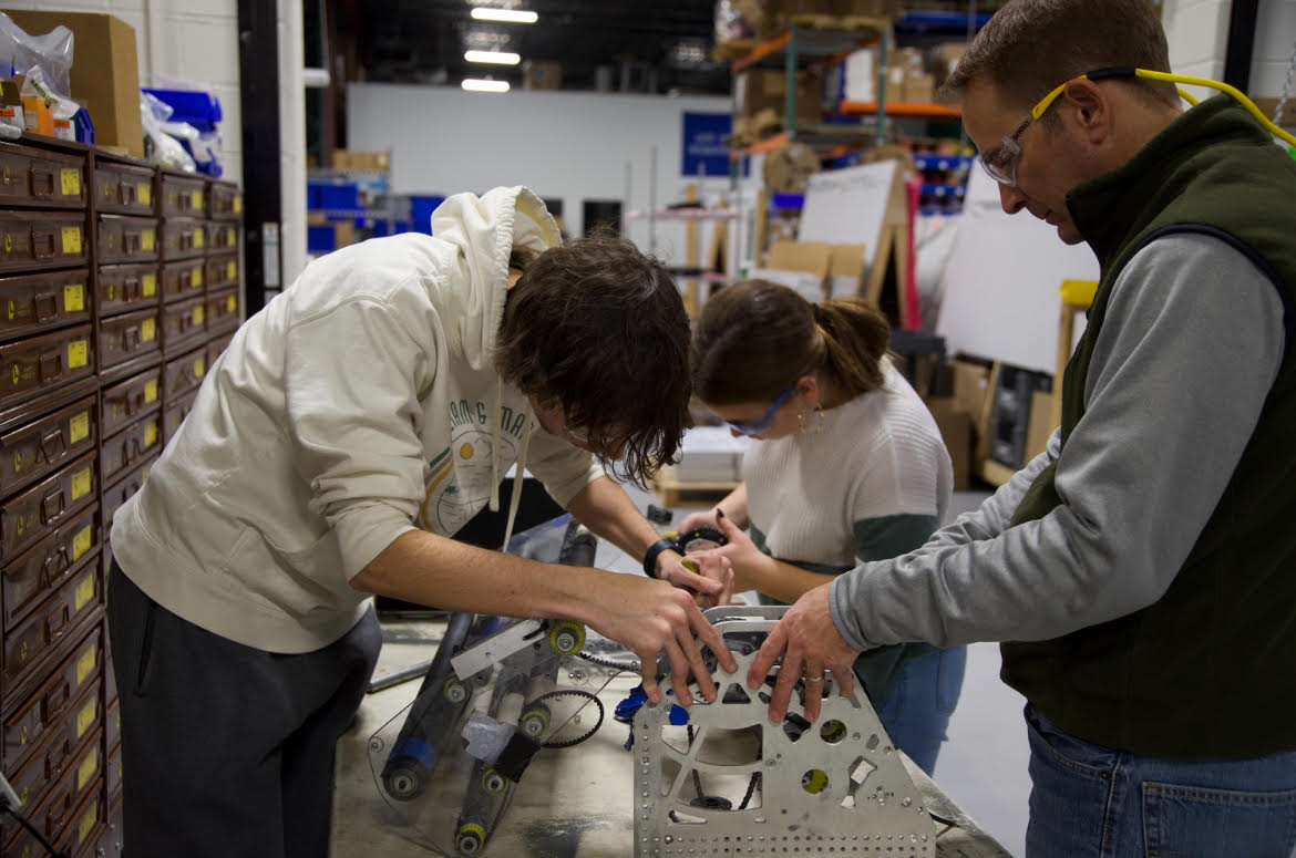 Blue Cheese Robotics adds adjustments to a robot.