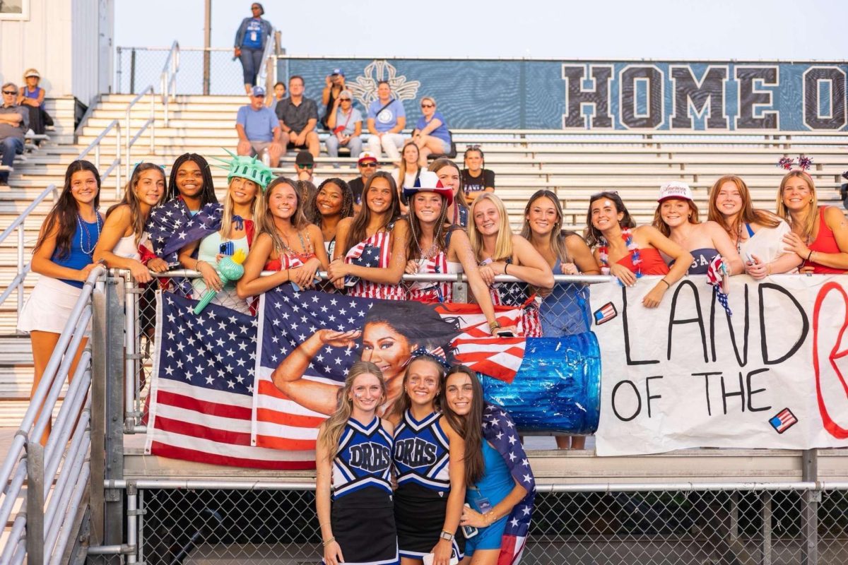 Students at Deep Run dress according to theme at football games, but the turnout is limited.