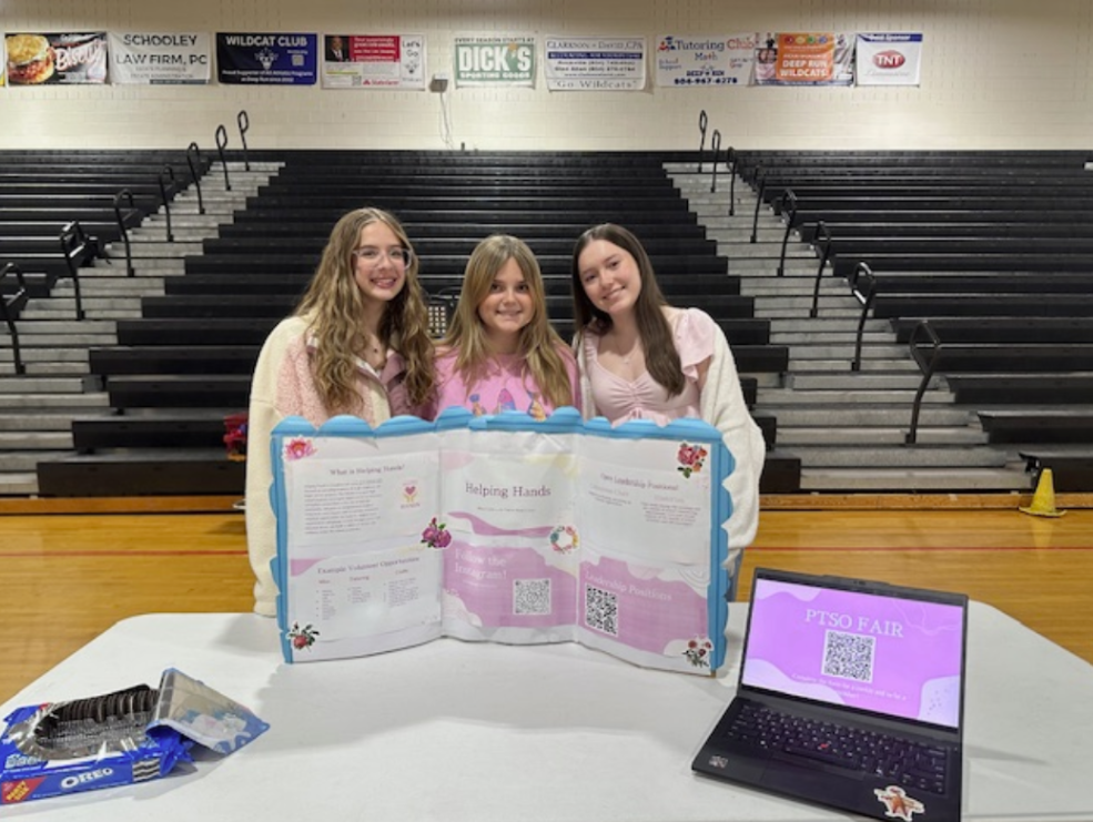 Coates, Colvin, and Walter present at the club fair.
