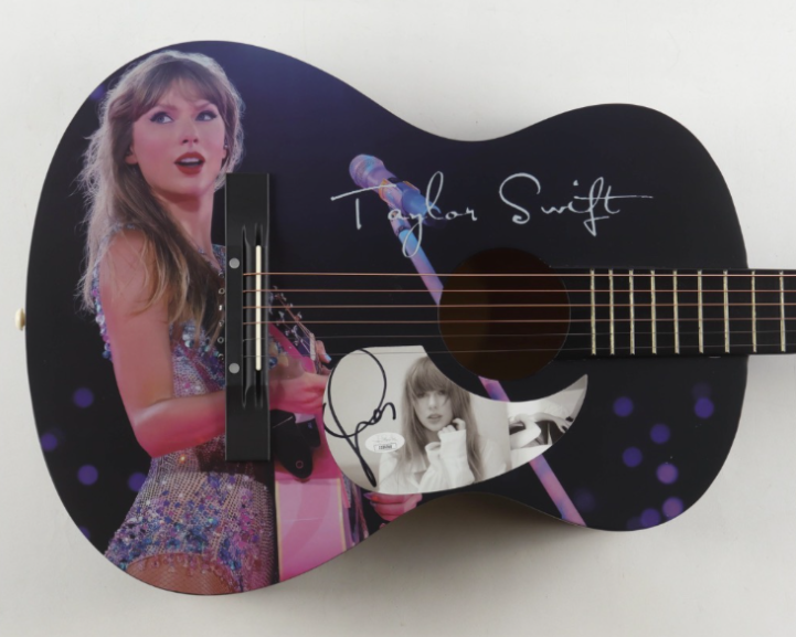 The signed Taylor Swift guitar was offered up for "The ULTIMATE Swiftie Raffle."  