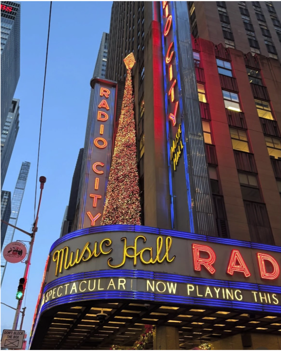 The Radio City Music Hall marquee shows the Rockettes Christmas Spectacular.
