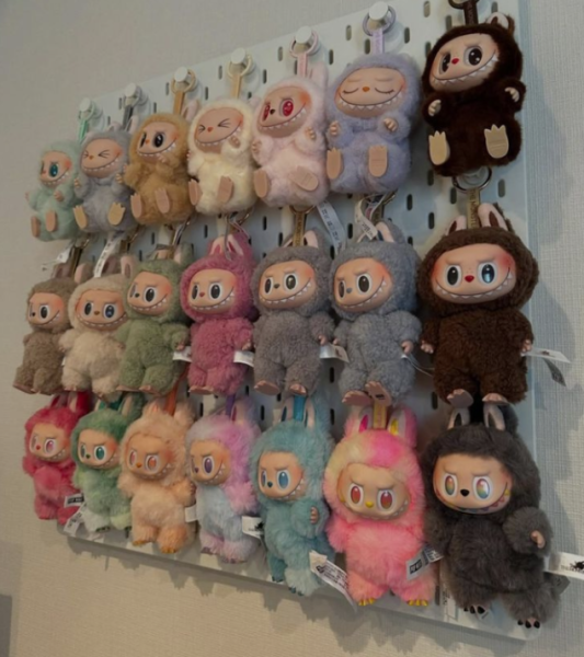 Overconsumption is taking over in the form of large Labubu plush toy collections. 