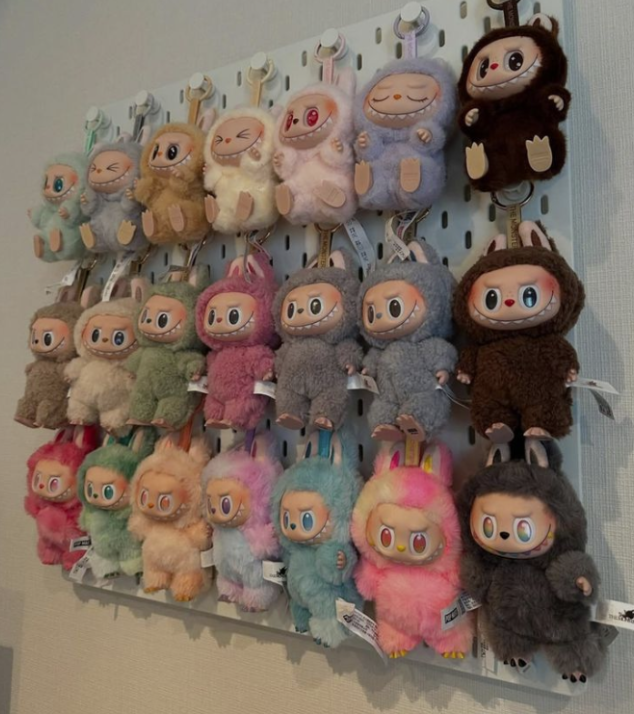 Overconsumption is taking over in the form of large Labubu plush toy collections. 