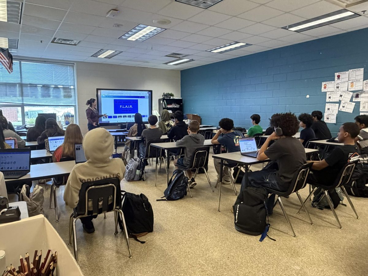 Freshman students in a Wildcat Connection listen to a lesson about Deep Run's F.L.A.I.R program. 