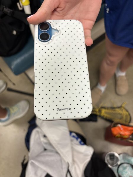 Freshman, Allie Fox's polka dot phone case.